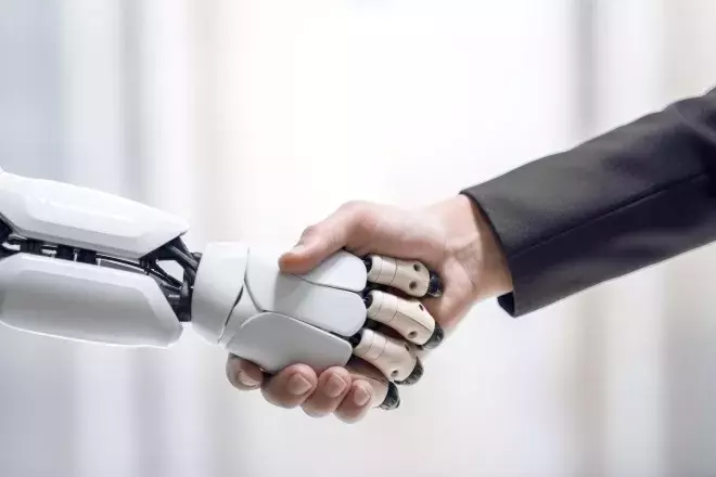 robot and human shaking hands