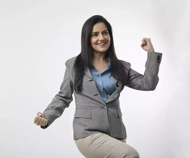 business woman celebrating