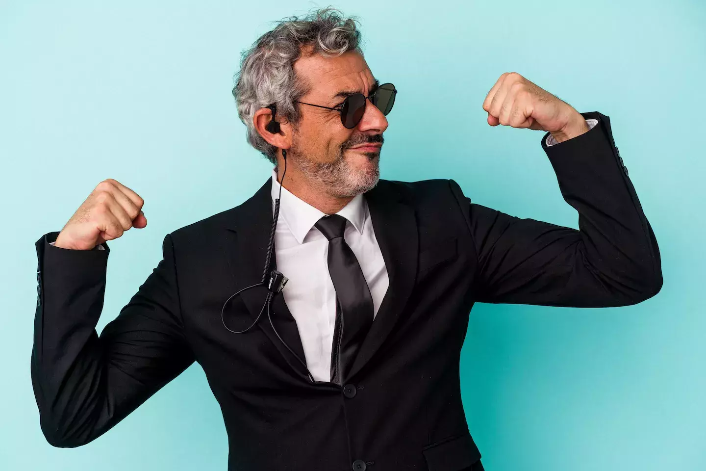 secret service person flexing