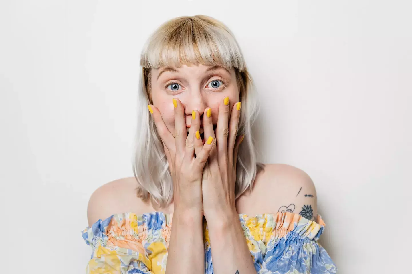 covering face with hands