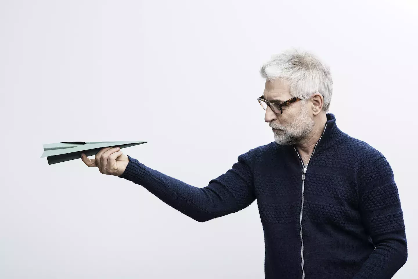 man with a paper airplane