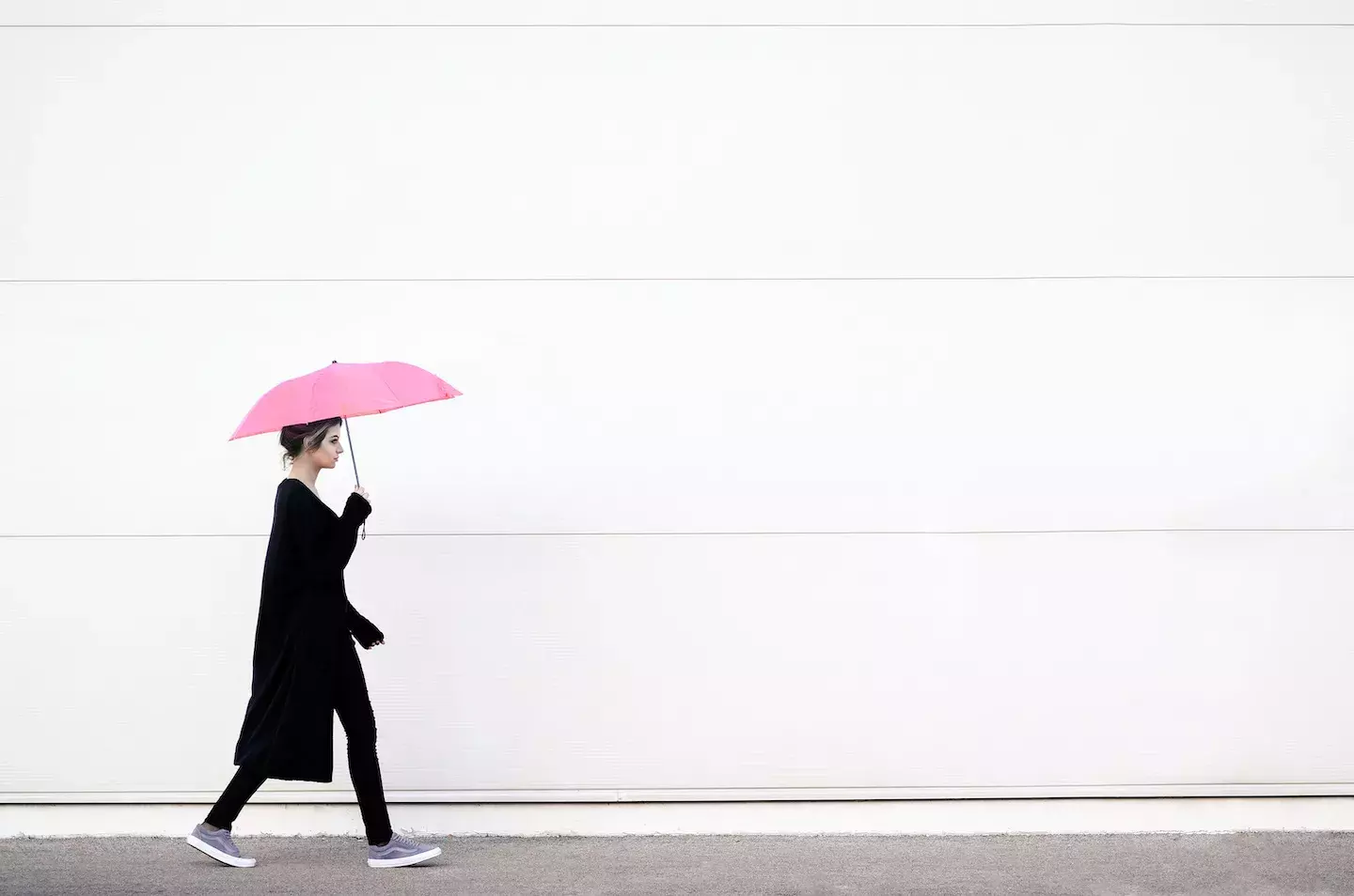 person walking with unbrella