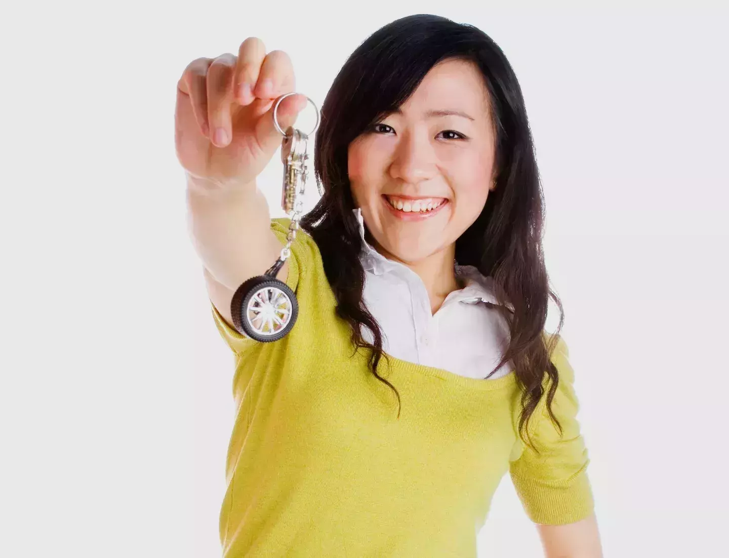 Woman holding car keys