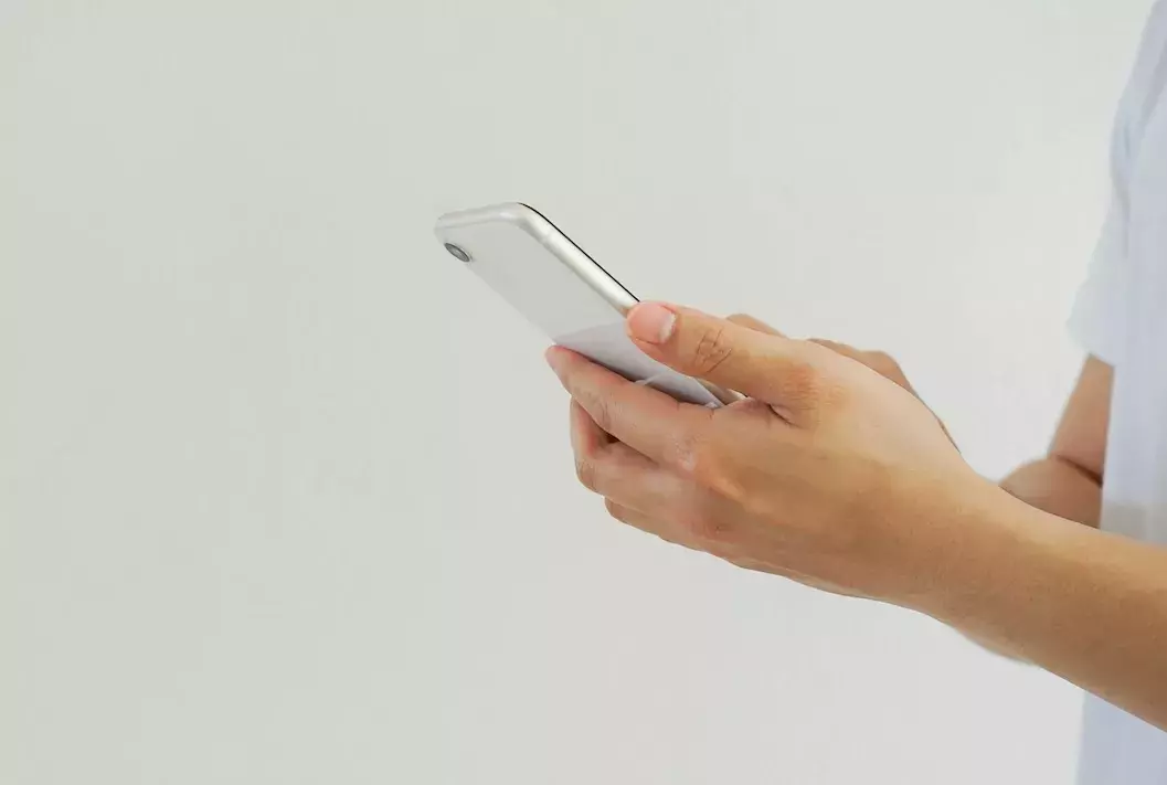 close up of person on cell phone