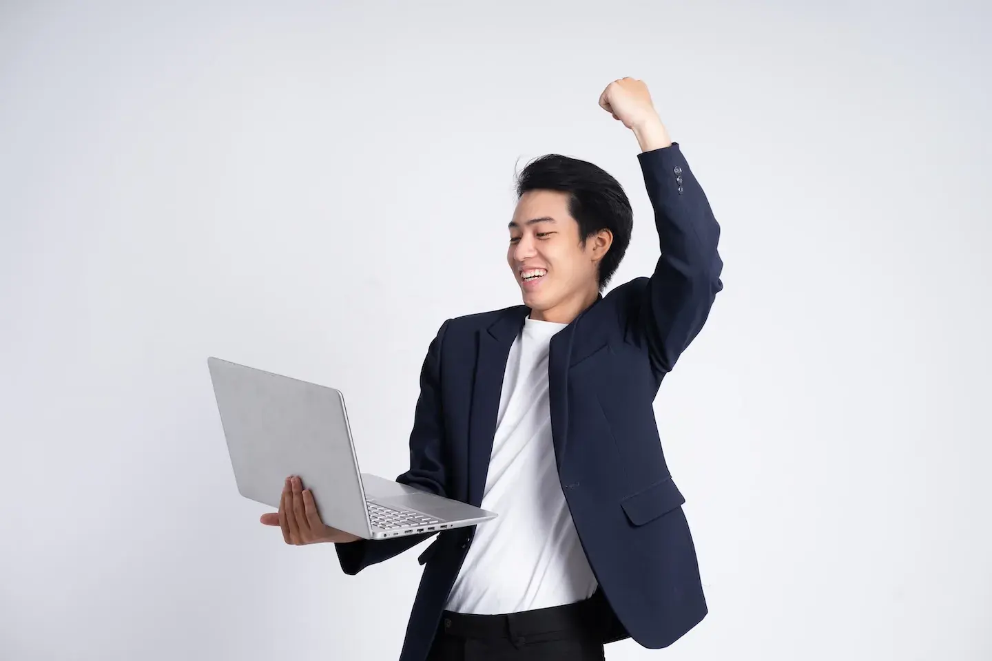 man with laptop excited expression